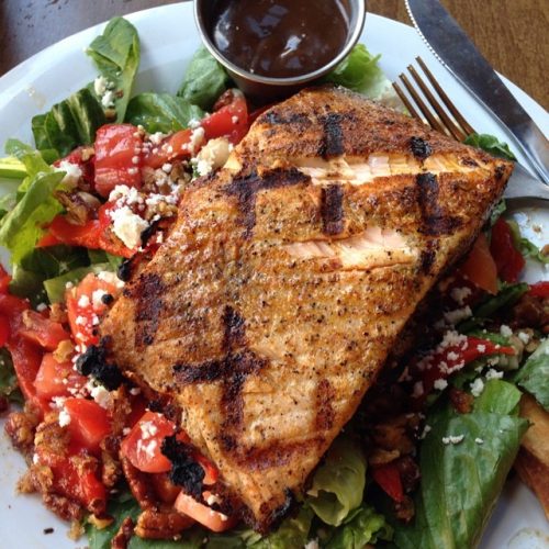 Image may include: mediterranean salad with salmon