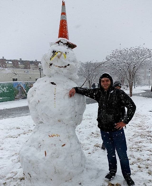 Photo via @evan braddock. Snowmen take over Birmingham: photo gallery