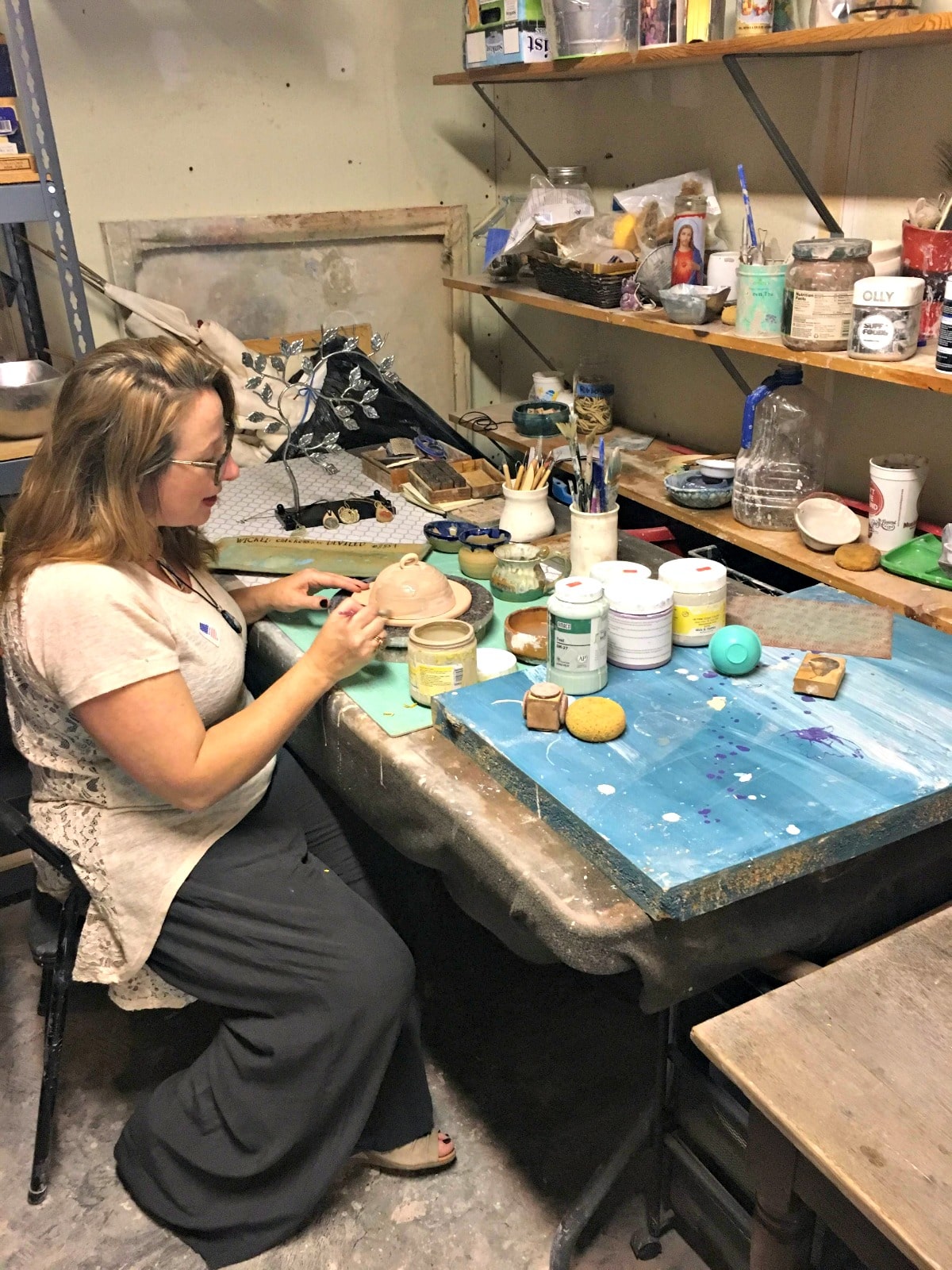 One of the Roebuck Springs potters, Nichole Lariscy Moore, at work in her studio. 