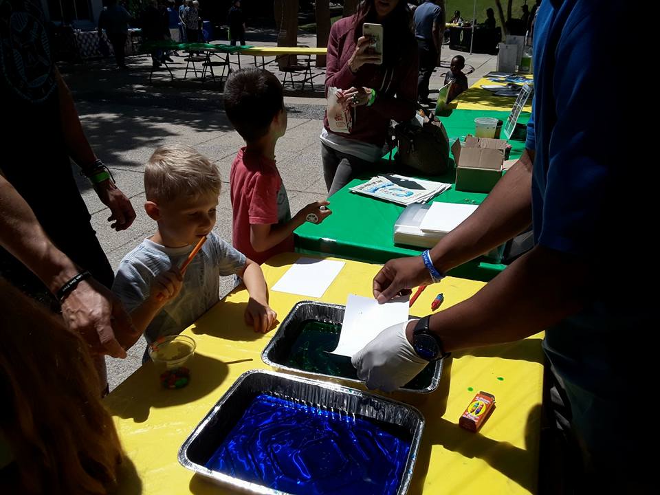 Children partake in an art activity at Birmingham Botanical Gardens' Earth Day event