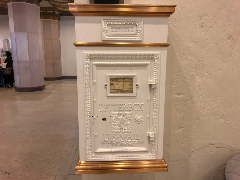 The restored US Mail Letter Box remains in the lobby at TJ Tower. Photo by Jon Eastwood for Bham Now.