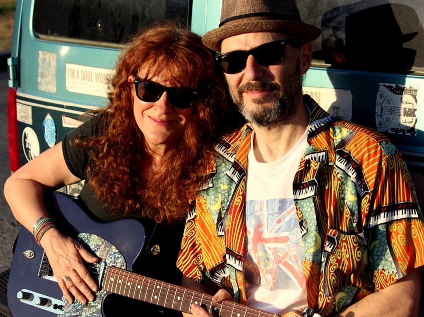 Photo blues musicians Debbie Bond, hold a guitar, and Radiator Rick. Both wear sunglasses. The pair is scheduled to play at the Market at Pepper Place 2019 in Birmingham, Alabama, on April 13