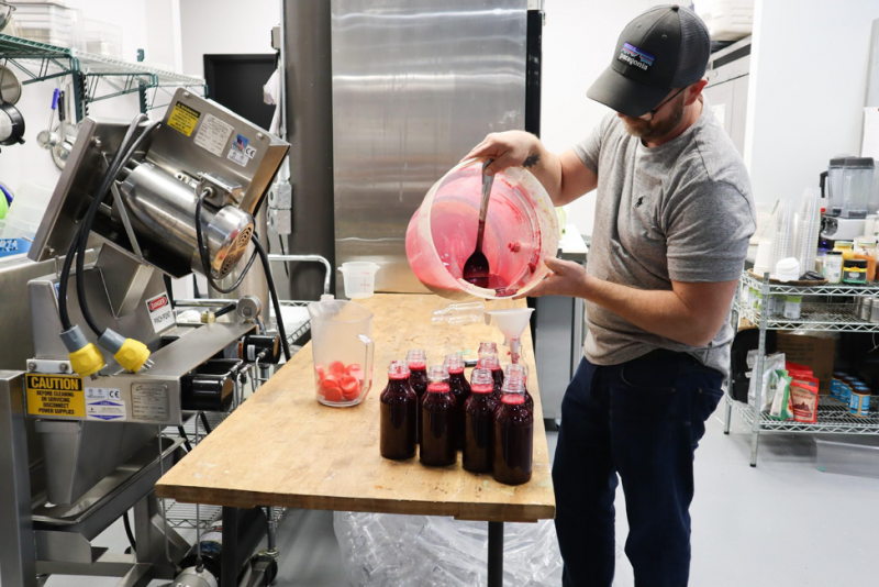 SproutAndPourMakingJuice Why Birmingham is going crazy for cold pressed juice. 5 reasons to check out Sprout & Pour in Founders Station