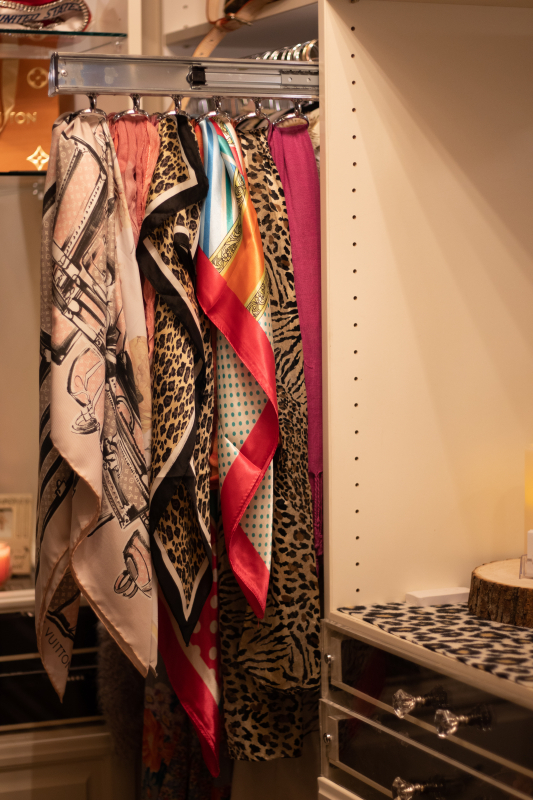 Scarf pulls are another nice feature in designer closets by Closets by Design. 