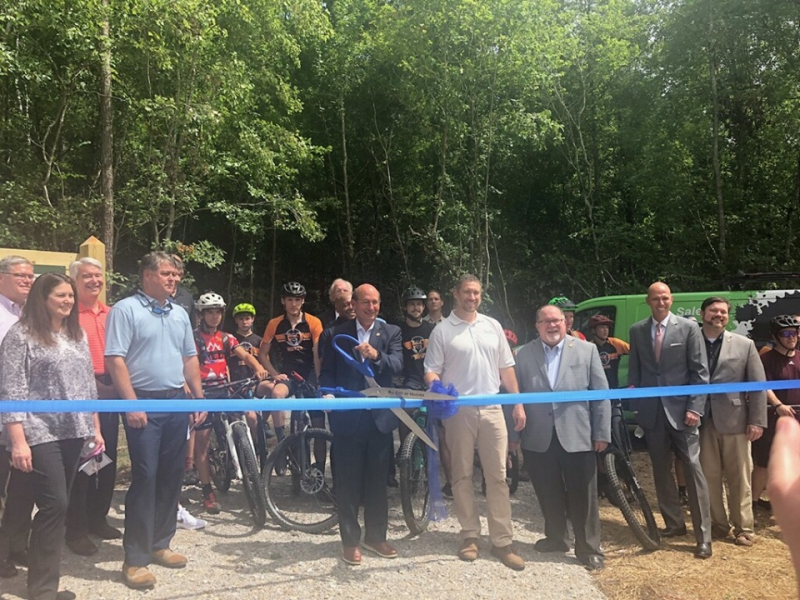 Cutting of the ribbon at Black Creek Mountain Bike Park by Hoover Mayor Frank Borato