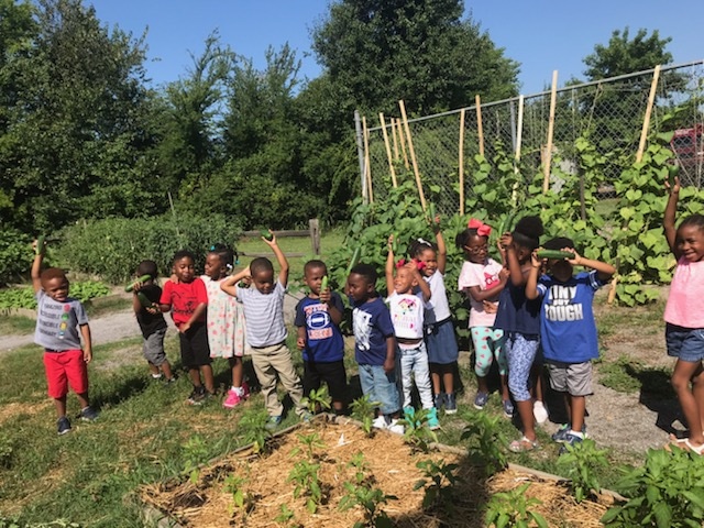 Summer campers in the garden at Greater Shiloh Missionary Baptist Church in the Jones Valley Neighborhood of Birmingham. 