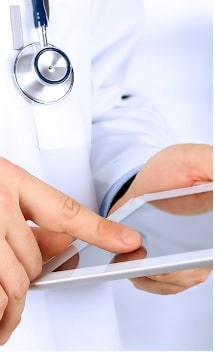 Doctor using a tablet device