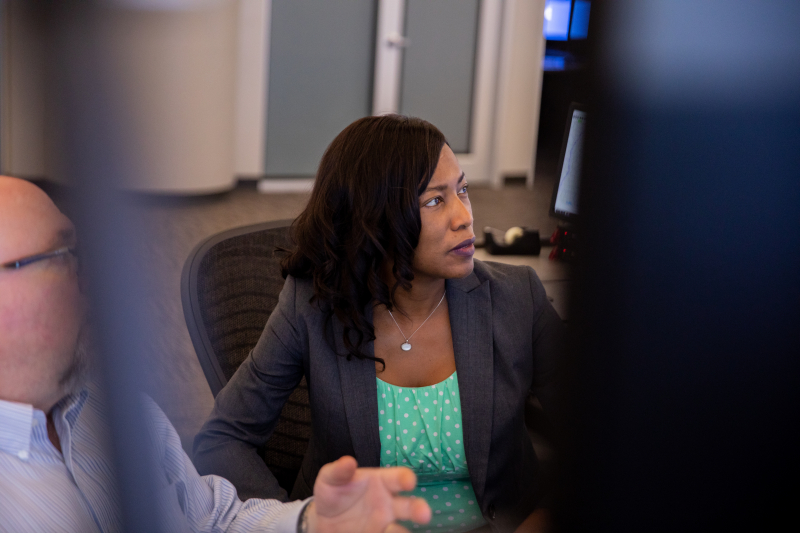 Shardra Scott in discussion with a colleague at Alabama Power's Birmingham Control Center
