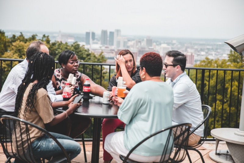 Friends socializing at Vulcan Park and Museum, Birmingham, Alabama with snacks , drinks and beverages from new kiosk
