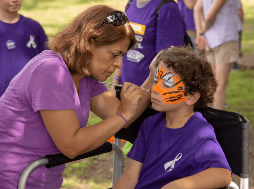 Face painting at the Walk to End Alzheimers's
