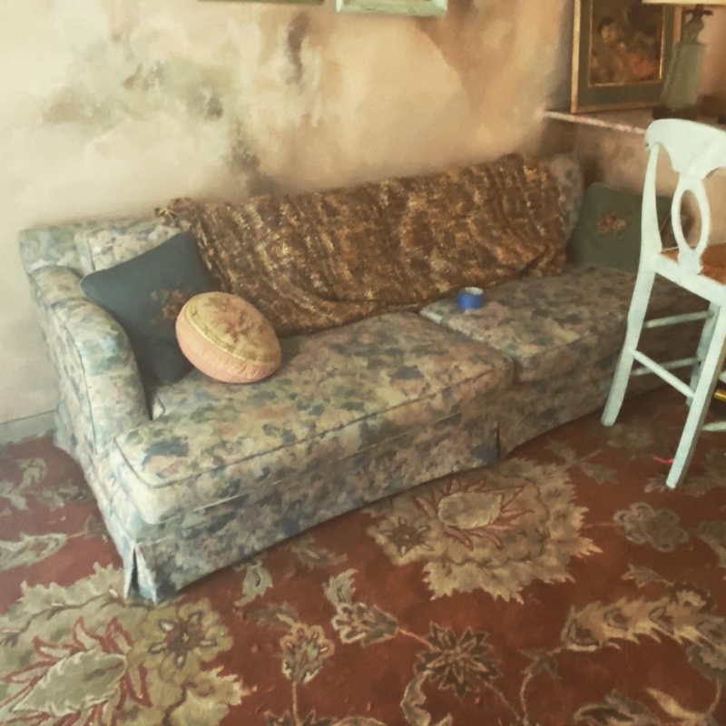 A couch on the set of "Collection".