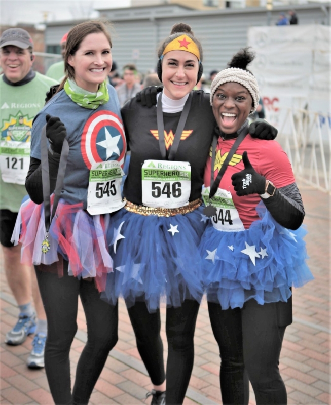 Your guide to the Mercedes-Benz Marathon Weekend and its 26.2 miles of fun 3 Superhero 5k 3 females in costume scaled 1 Your guide to the Mercedes-Benz Marathon Weekend and its 26.2 miles of fun