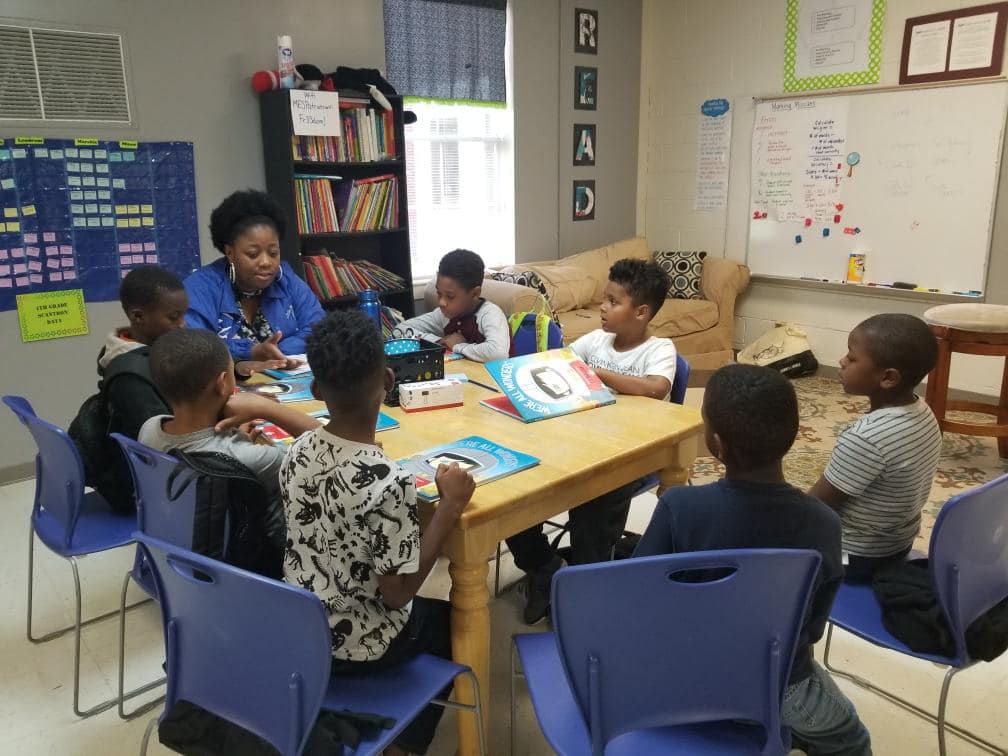 Children learning to love reading at I See Me, Inc.