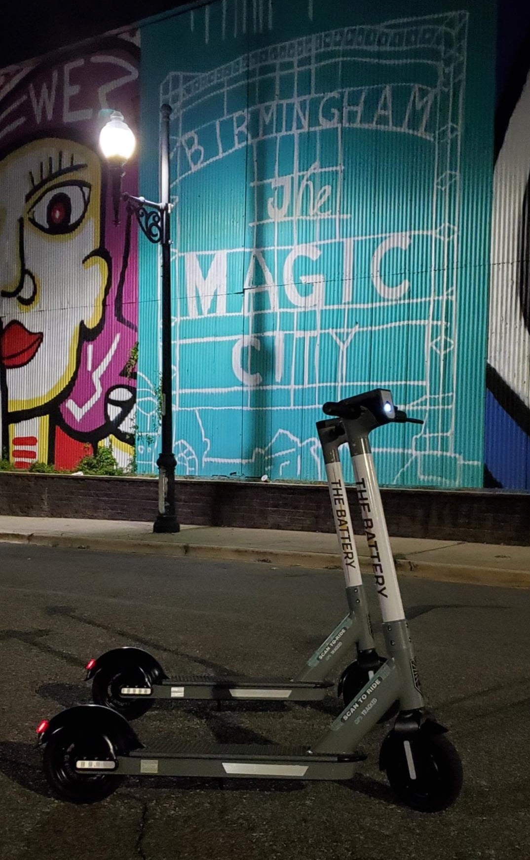 Photo of The Battery scooters by The Magic City mural
