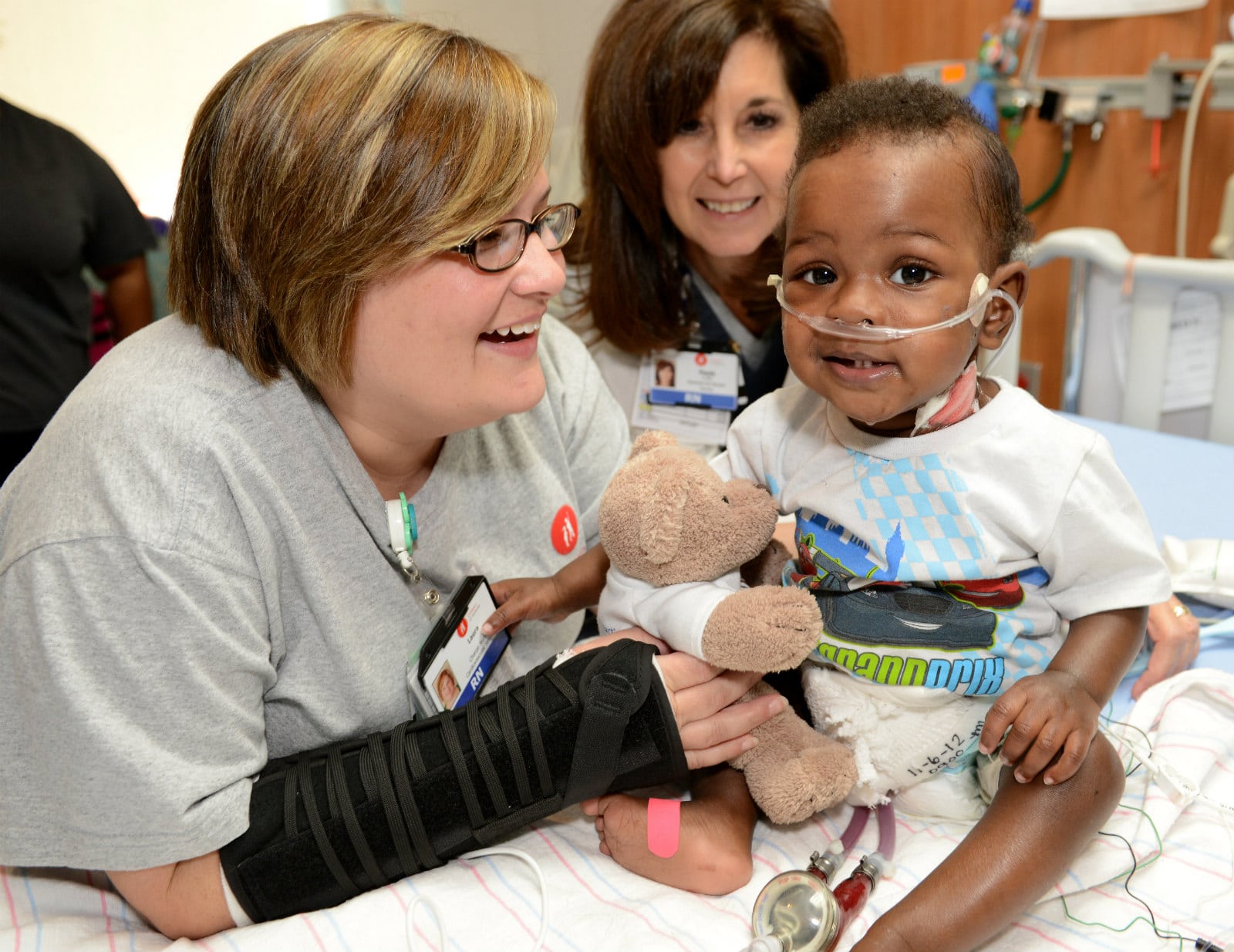 Nursing with a  small patient at Children's of Alabama