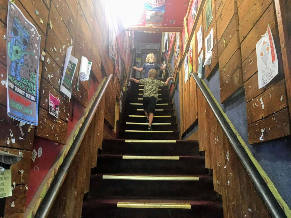 kids walking up stairs at Charlemagne Record Exchange