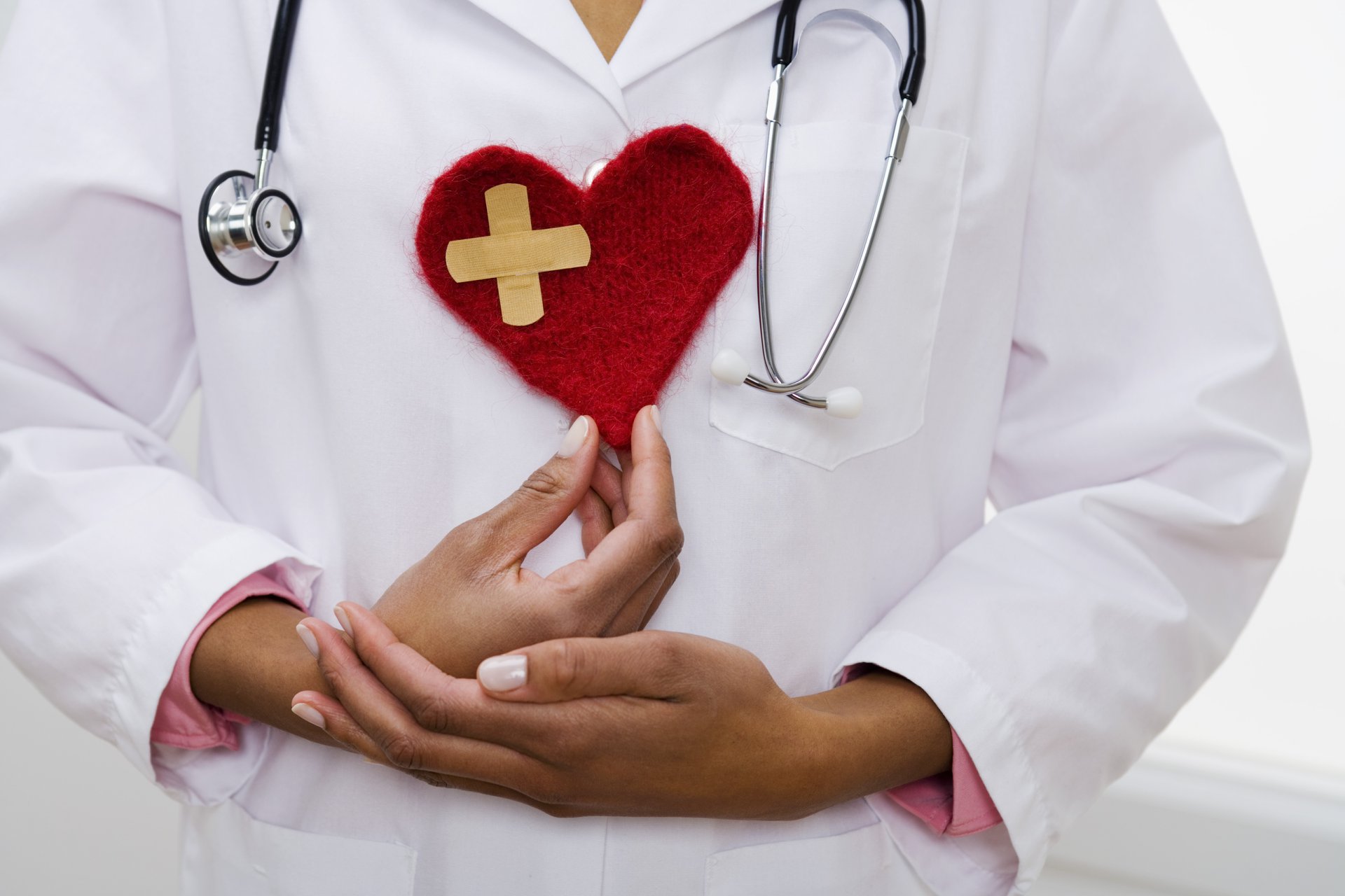 doctor mending a hurt heart for women's health