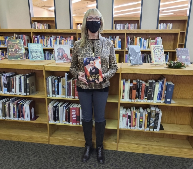 Leading for a lifetime: Major General Lee Price's new book 5 Major General Lee Price in a bookstore with her new book.