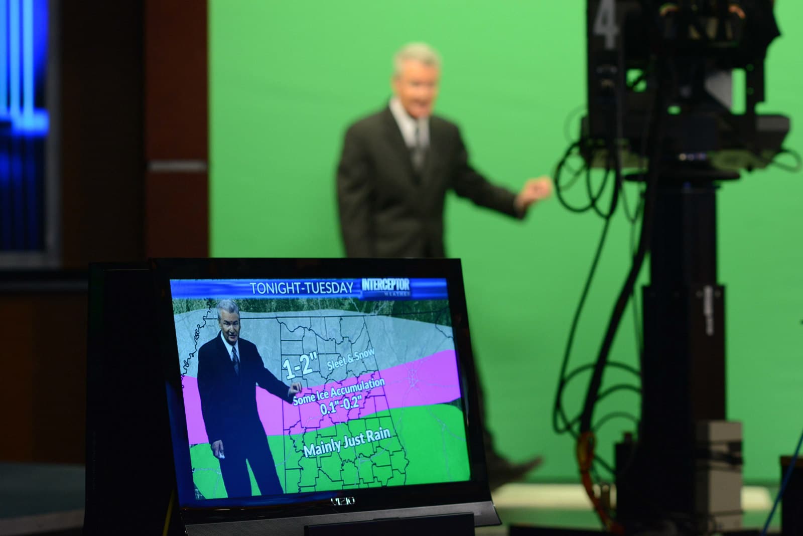Jerry Tracy of WVTM 13 in front of a green screen