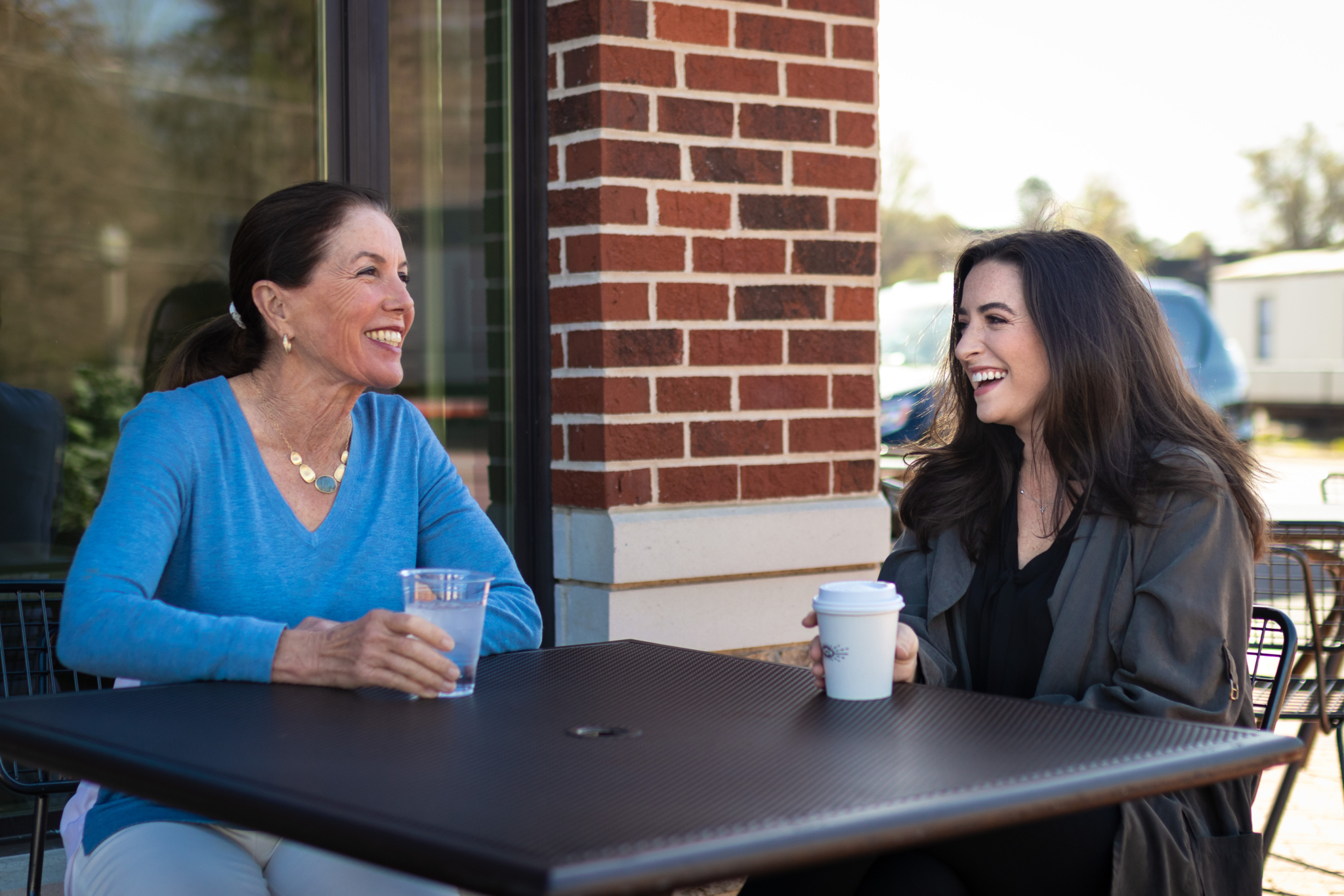 The Birmingham housing market is hot—here are 4 tips for new homebuyers 6 Lauren Branch and Betsy Dreher sitting at Revelator - Birmingham housing market