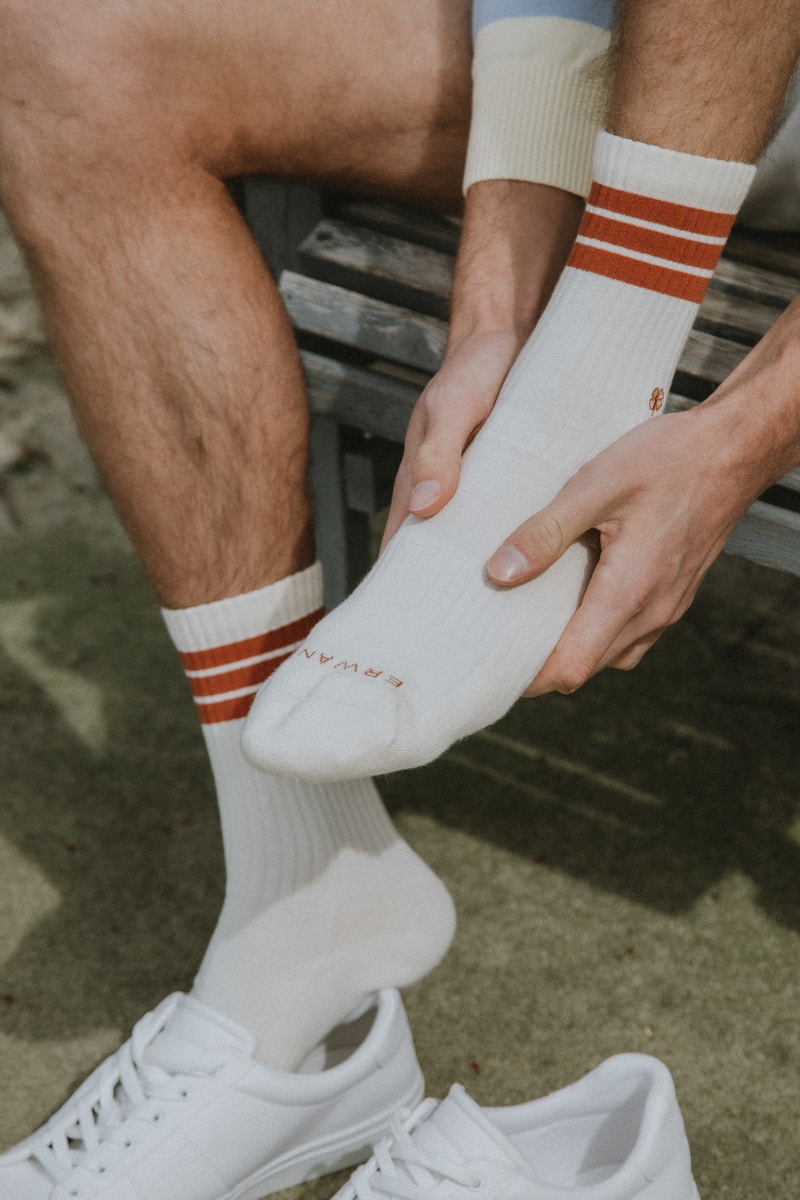 person wearing white socks, protect your joints