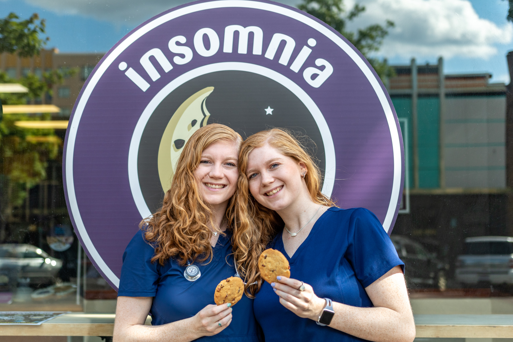 Aycock twins in front of Insomnia Cookies, nurses at Brookwood Baptist