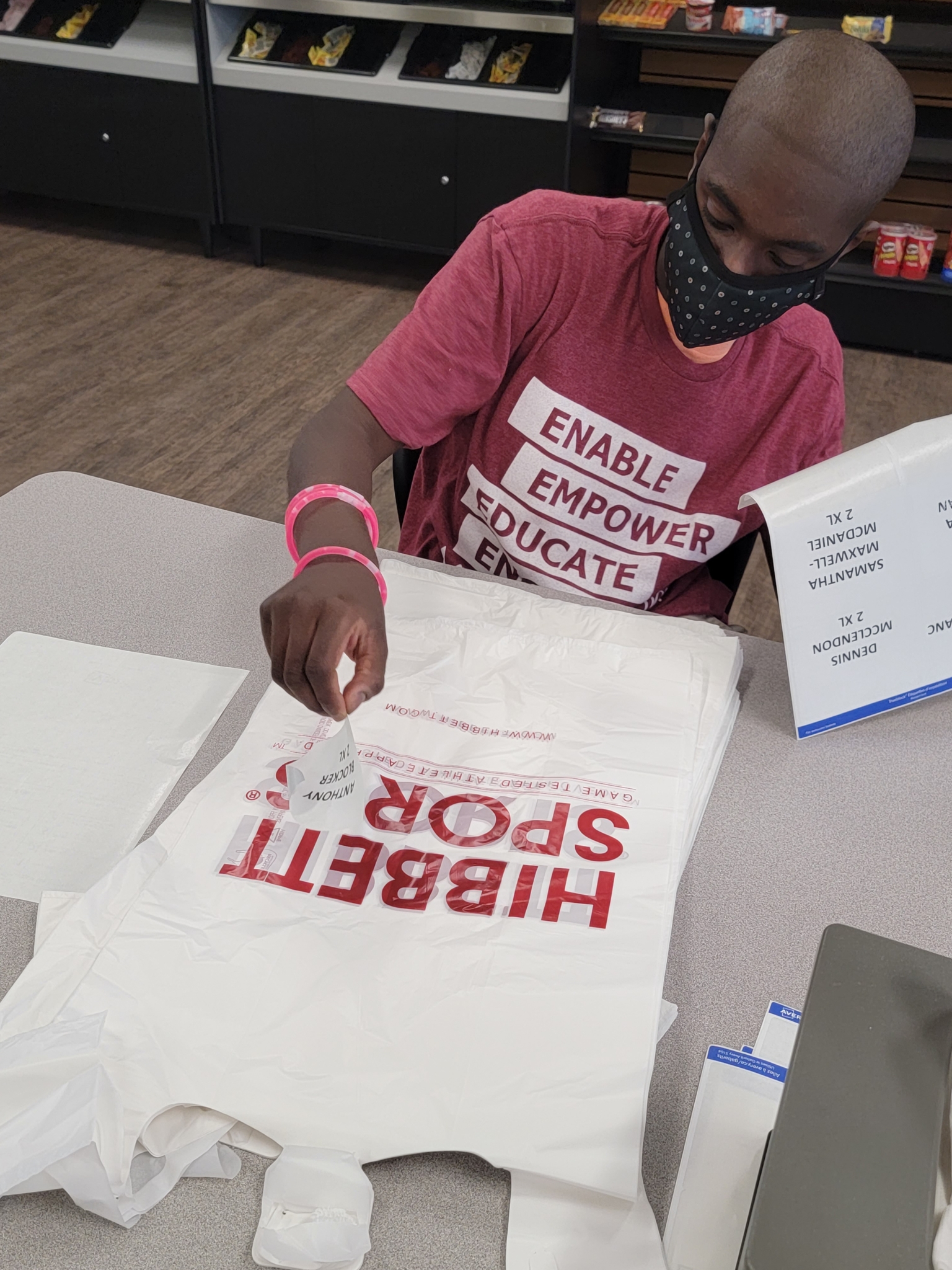United Ability partners with Hibbett to host summer jobs 2 Student works at Hibbett as part of the JETS Program