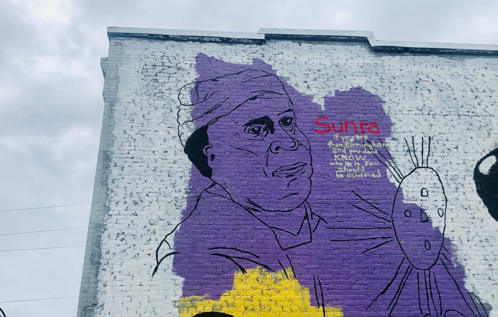 Sun Ra mural on 41st Street: "If you are from Birmingham and you don't know who he is you should be ashamed." Photo by Pat Byington for Bham Now