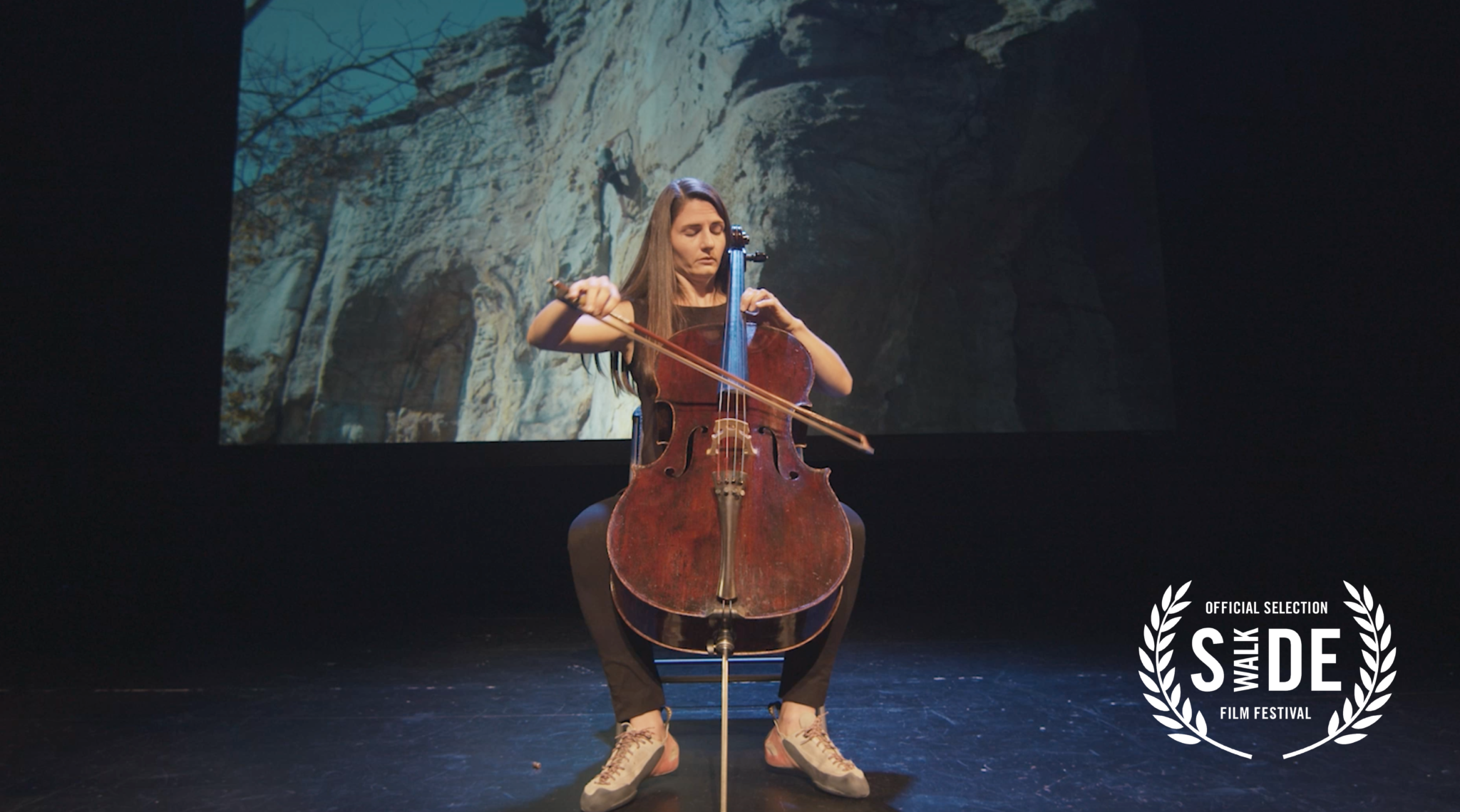 Alabama Symphony Orchestra cellist Hellen Weberpal combines music, climbing and film in Alabama Clims. Photo via John Manzelli