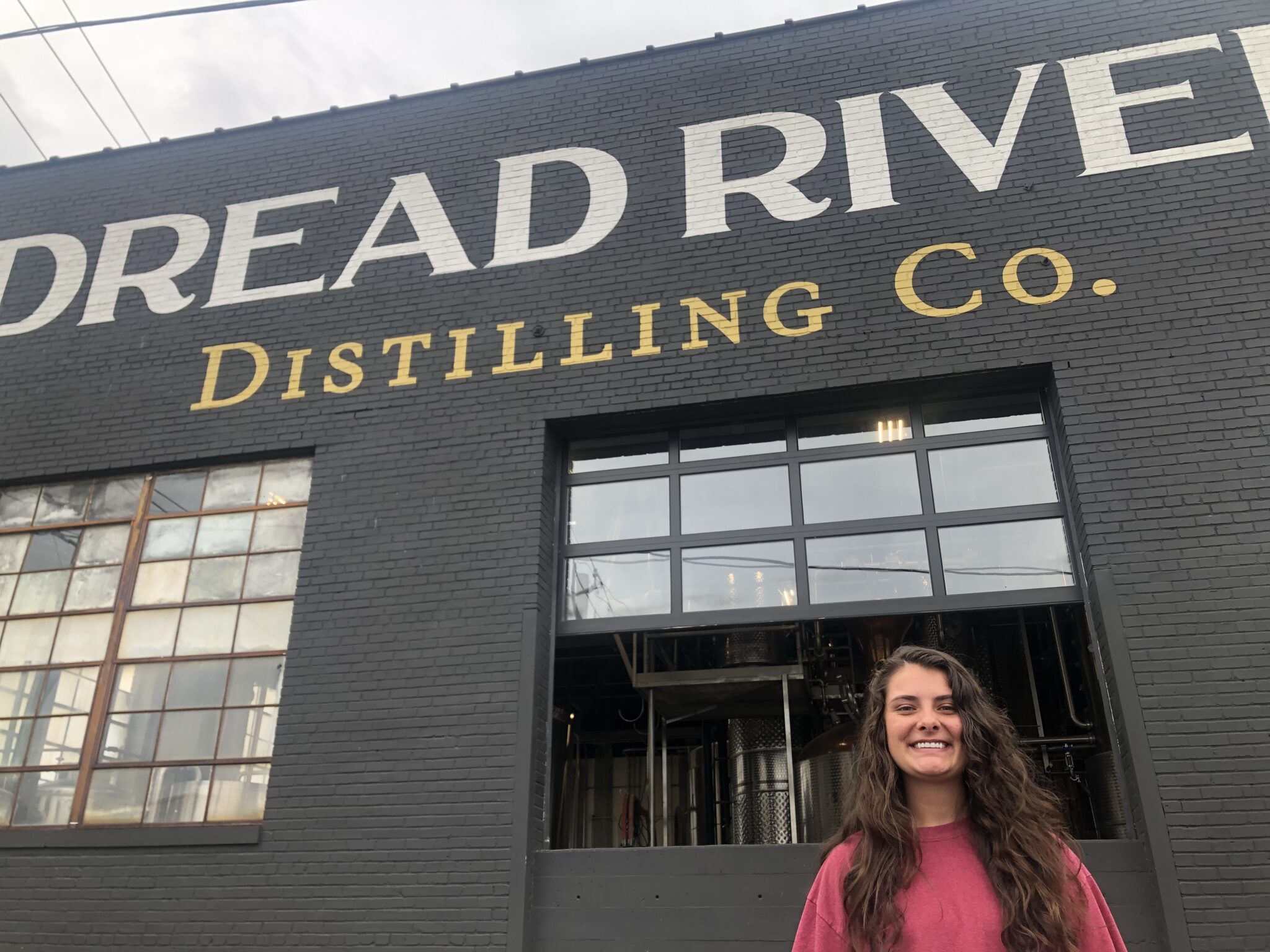Skyler is a big fan of Dread River and all things bourbon. Photo via Pat Byington for Bham Now