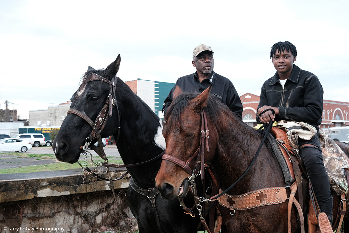Ronald Howard and Rodney Howard on horses. 