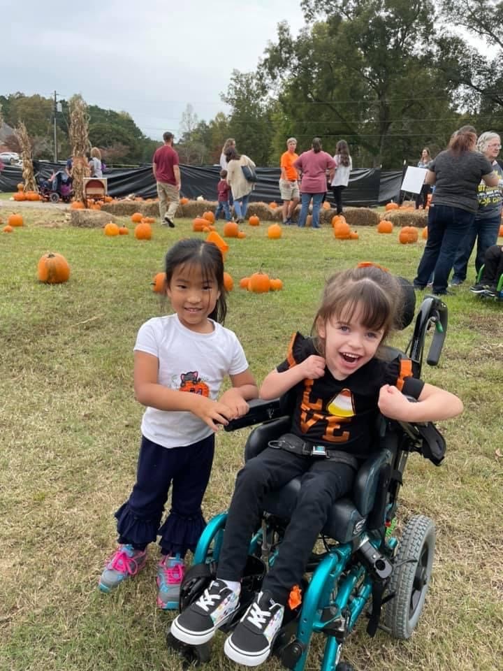 Boston and her friend at the pumpkin patch