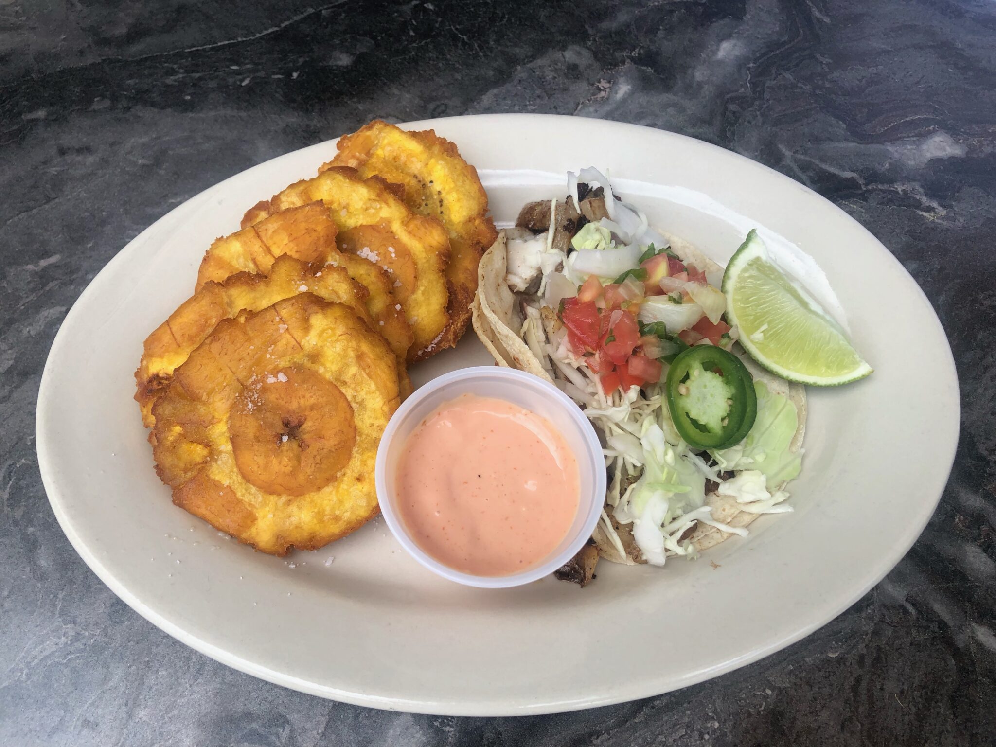 10 best things we ate in Birmingham in March 8 Tostones and fish tacos from EATS Highland - what to eat in birmingham