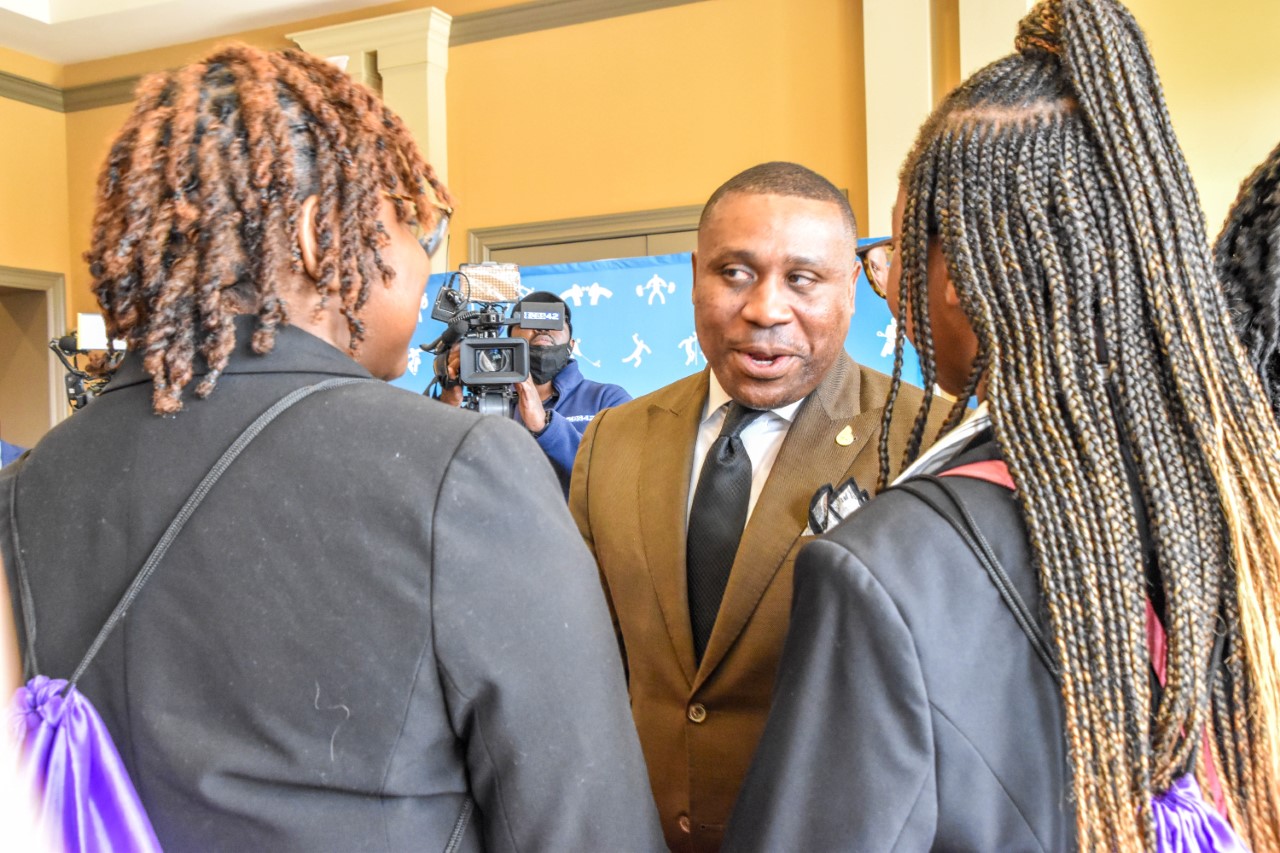 Porter Speaking With Students 