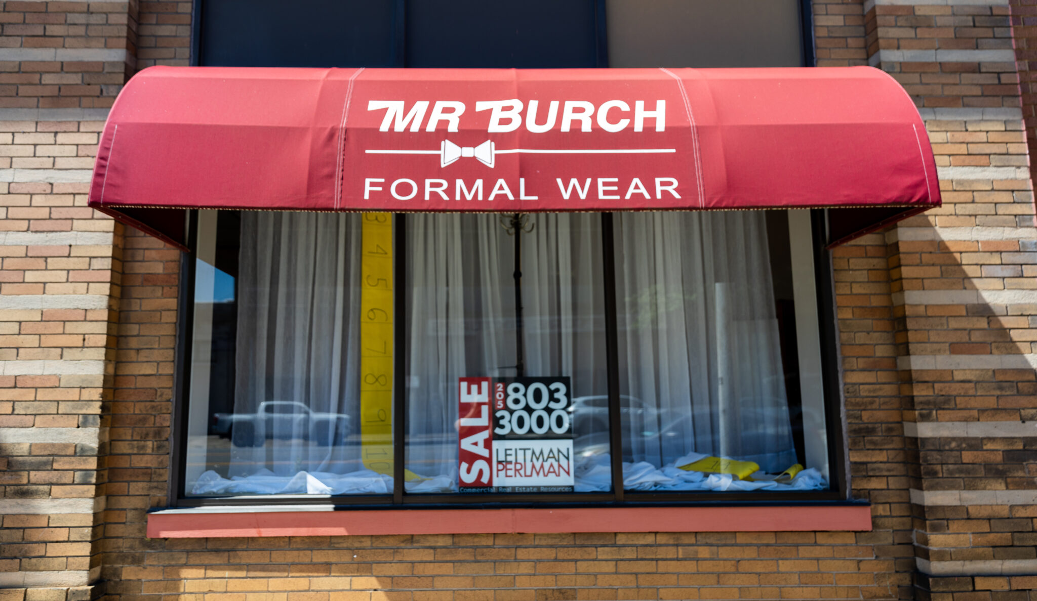 4H4A0537 Longtime men's formal wear business Mr. Burch closes on First Ave. N