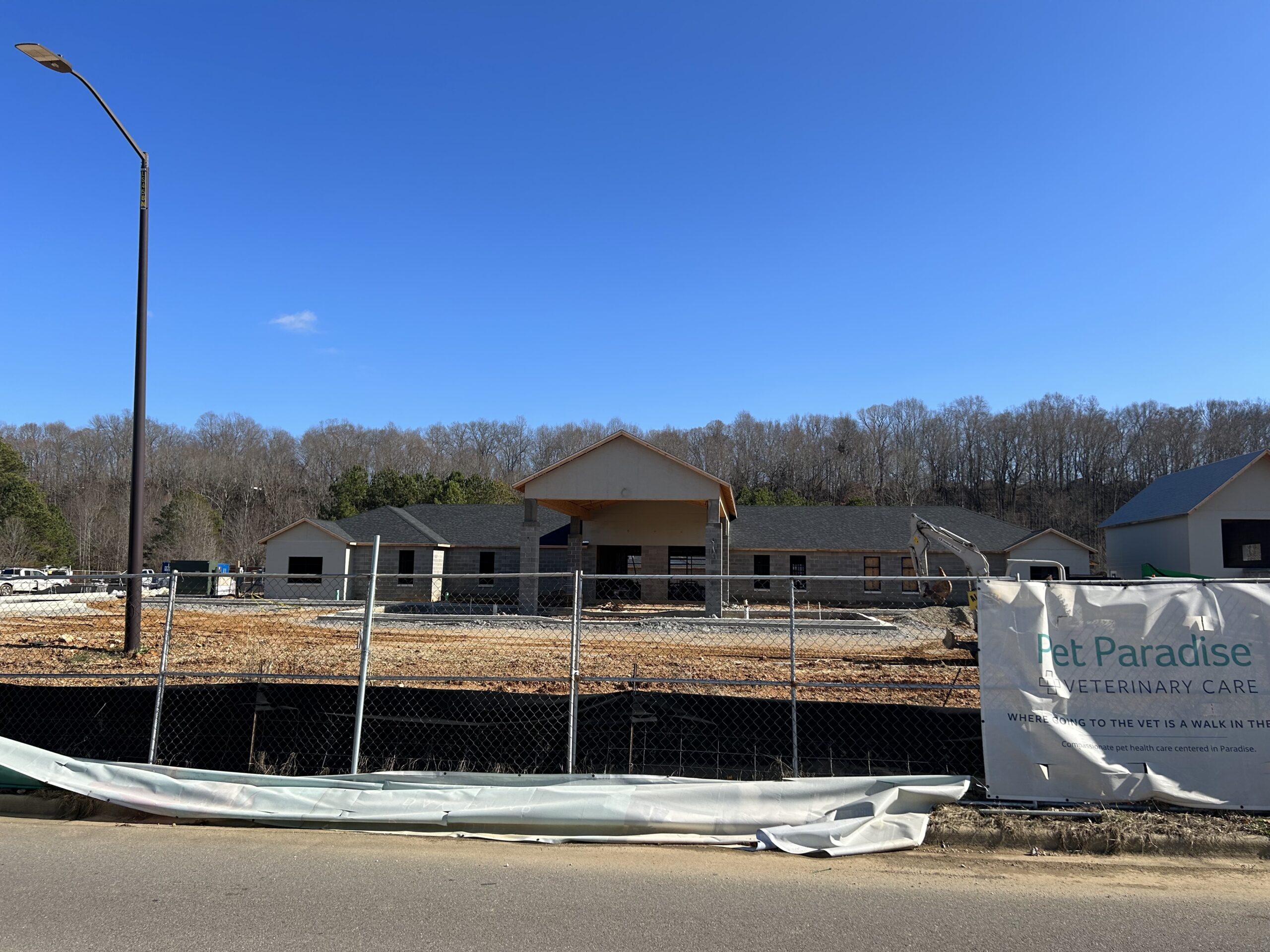 Pet Paradise a boarding, grooming, & vet care facility opening first