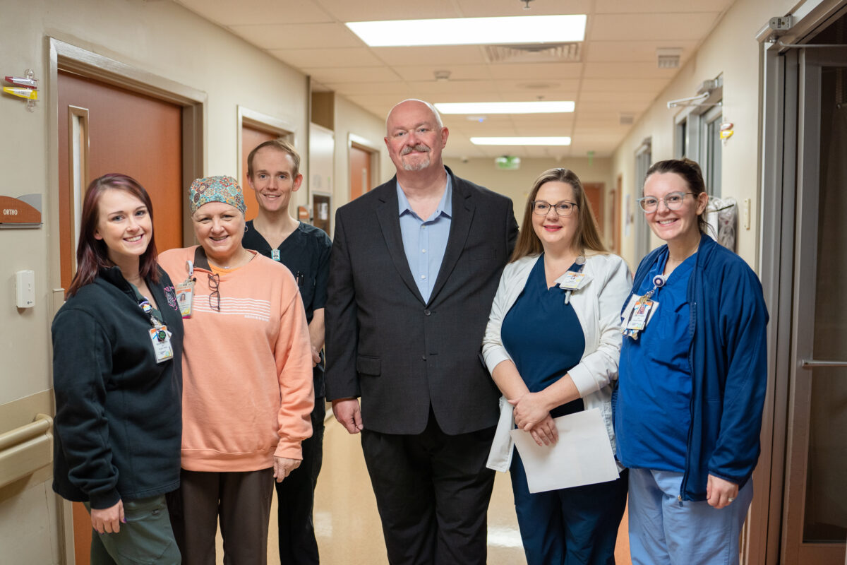 When he took a new job at a local hospital, one man had no idea colleagues would save his life