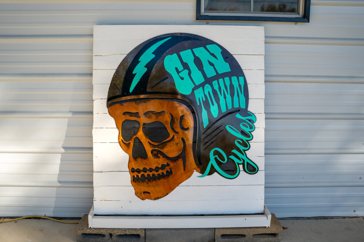 a sign on a white surface