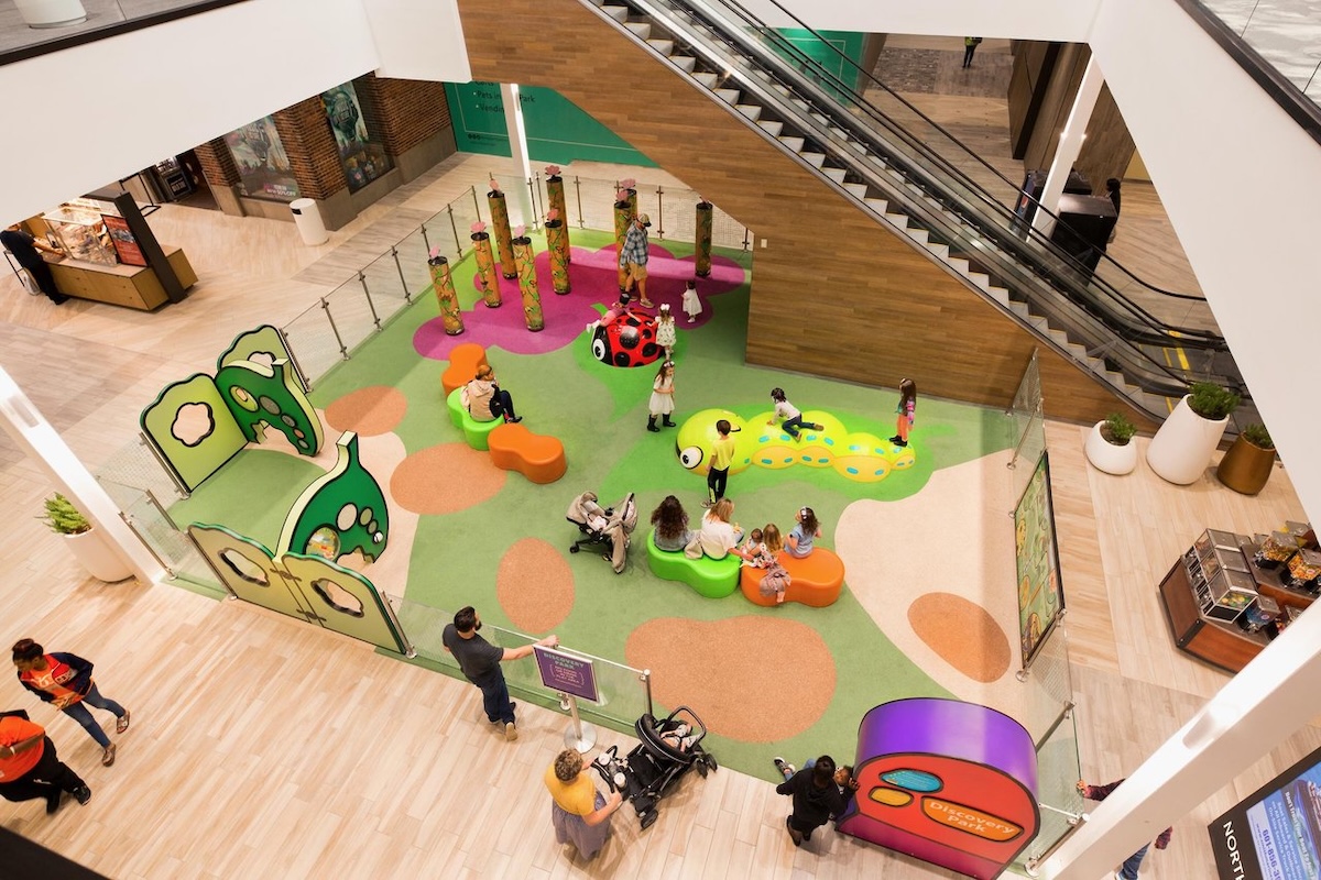 Looking down on families and kids playing in Discovery Park in Northpark shopping mall in Ridgeland, Mississippi